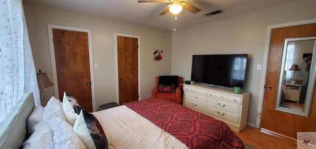 bedroom featuring ceiling fan and light wood-type flooring