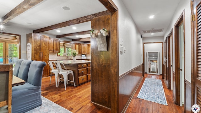 10 High Point Dr, Texarkana, TX 75503 - hall featuring beam ceiling, wood-type flooring, healthy amount of natural light, french doors, and recessed lighting