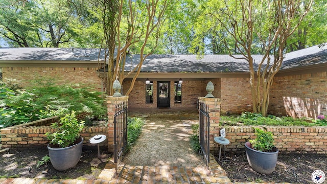 10 High Point Dr, Texarkana, TX 75503 - exterior space with brick siding and roof with shingles