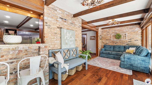 10 High Point Dr, Texarkana, TX 75503 - living room featuring beam ceiling, wood-type flooring, and brick wall