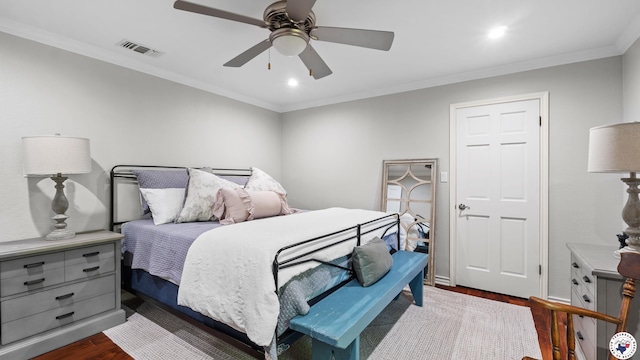 10 High Point Dr, Texarkana, TX 75503 - bedroom with dark wood-style flooring, recessed lighting, ornamental molding, and a ceiling fan