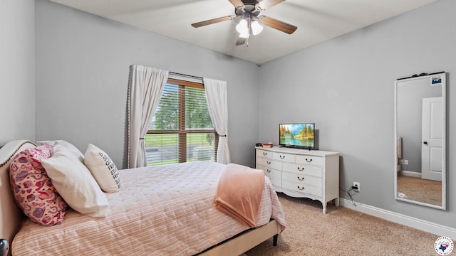 bedroom with baseboards, ceiling fan, and carpet floors