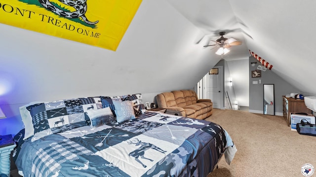 carpeted bedroom featuring lofted ceiling