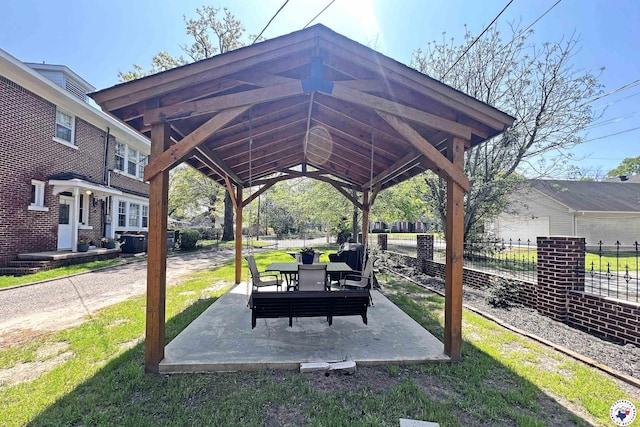 1203 Grand Ave, Texarkana, AR 71854 - surrounding community with fence, a gazebo, and a patio area
