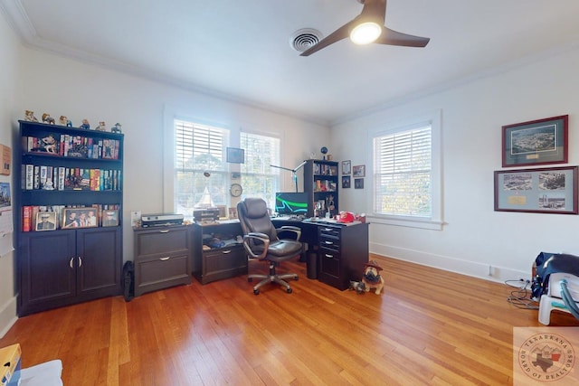 office area featuring ornamental molding, ceiling fan, light hardwood / wood-style flooring, and plenty of natural light