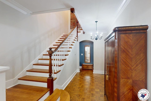 1203 Grand Ave, Texarkana, AR 71854 - foyer with arched walkways, stairs, ornamental molding, and baseboards