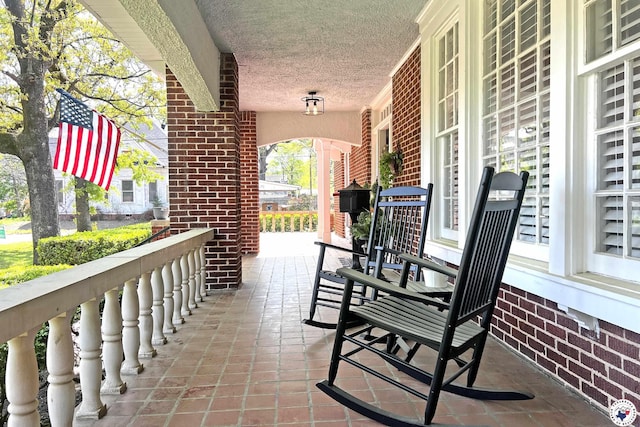 1203 Grand Ave, Texarkana, AR 71854 - view of patio featuring covered porch