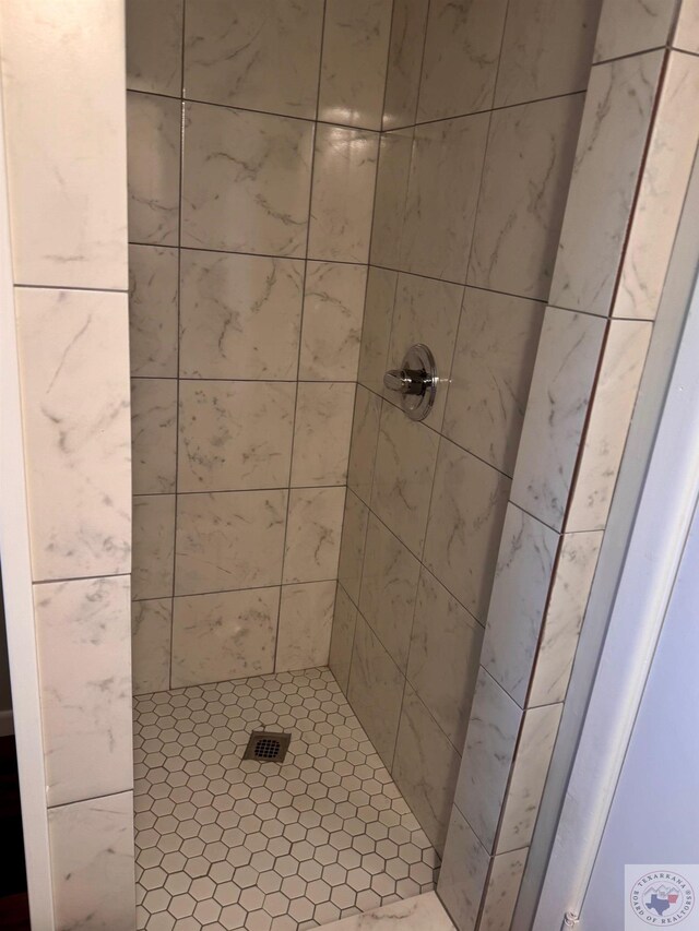 full bath featuring a stall shower