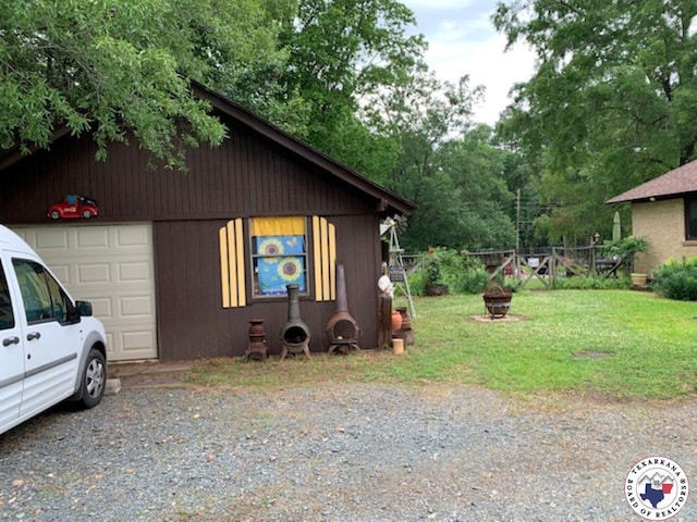 view of property exterior featuring a lawn