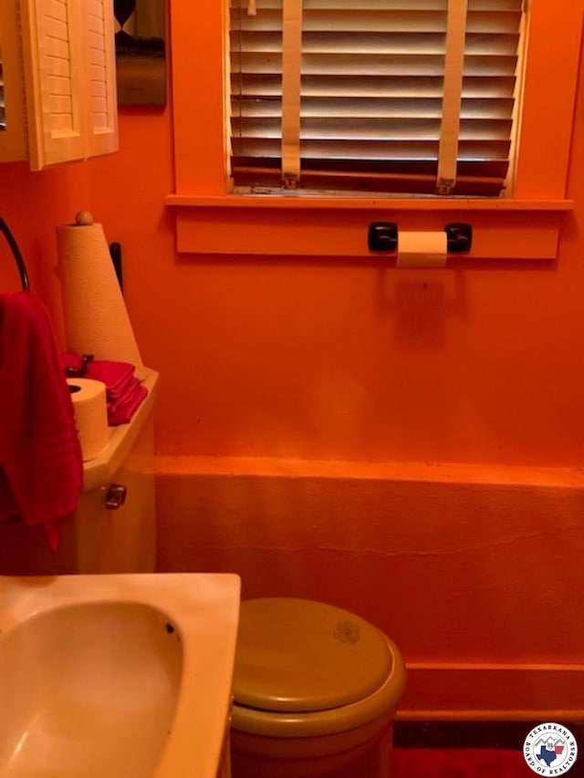 1212 Grape St, Texarkana, AR 71854 - bathroom with toilet and a sink