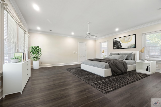 bedroom with ceiling fan, dark hardwood / wood-style floors, and ornamental molding