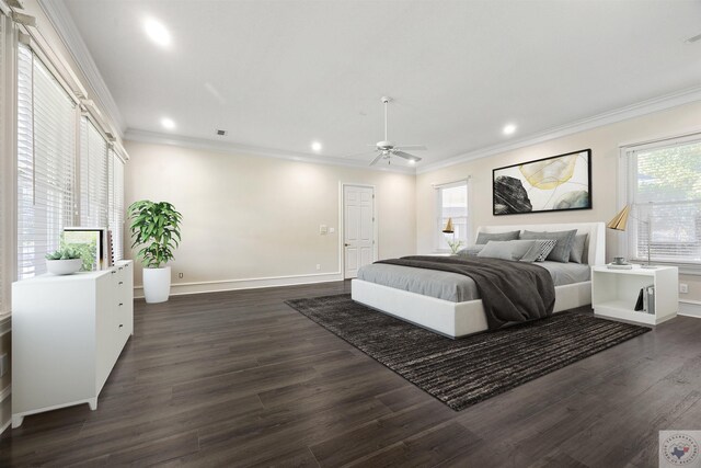 bedroom featuring ornamental molding, dark wood-style flooring, recessed lighting, and baseboards