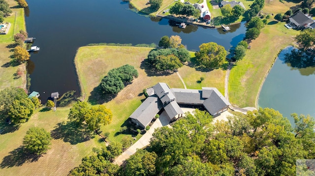 drone / aerial view with a water view