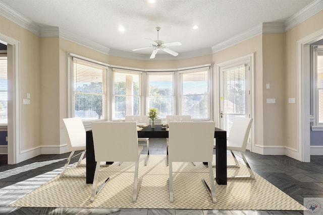 dining room with a textured ceiling, ceiling fan, recessed lighting, baseboards, and ornamental molding