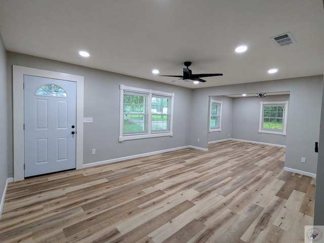 entrance foyer featuring light wood-type flooring and ceiling fan