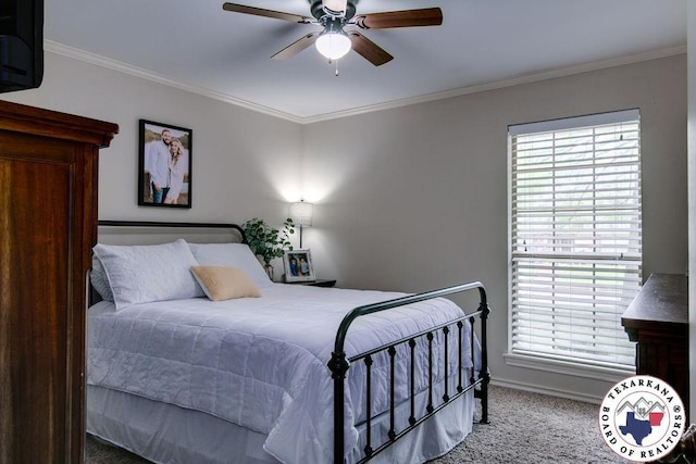 bedroom featuring a ceiling fan, baseboards, crown molding, and carpet