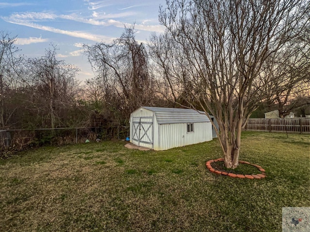 outdoor structure at dusk with a lawn