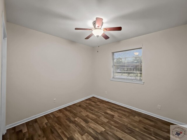 empty room with ceiling fan and dark wood-type flooring