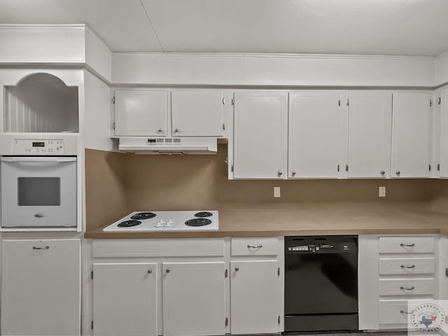 kitchen featuring white appliances and white cabinets