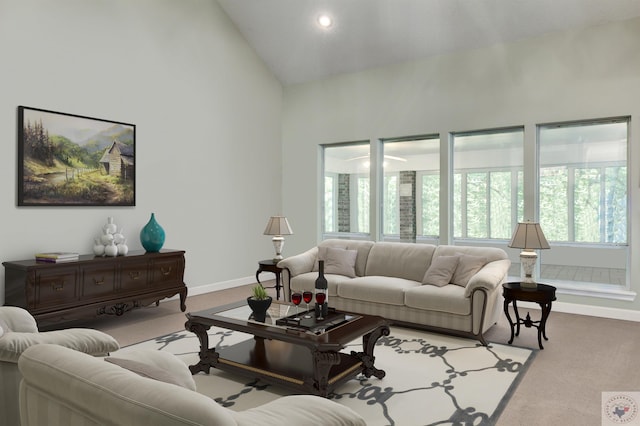 carpeted living room with high vaulted ceiling