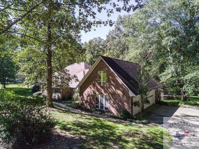 view of property exterior with a lawn