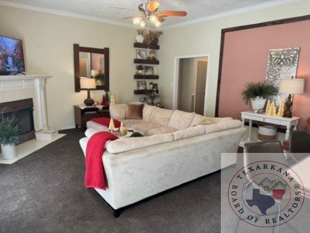 living room with a textured ceiling and ornamental molding