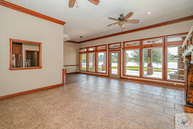 spare room with ceiling fan and ornamental molding