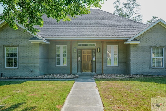 view of front of home with a front lawn