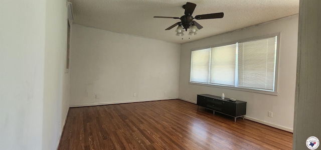3507 Belmont Ave, Texarkana, AR 71854 - empty room featuring ceiling fan, wood finished floors, and a textured ceiling