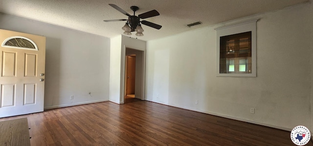 3507 Belmont Ave, Texarkana, AR 71854 - unfurnished room with wood finished floors, a ceiling fan, and a textured ceiling