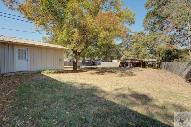 view of yard featuring a trampoline