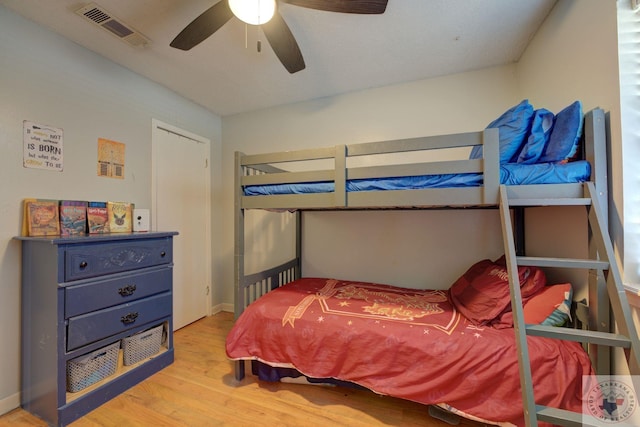 bedroom featuring light wood-type flooring and ceiling fan