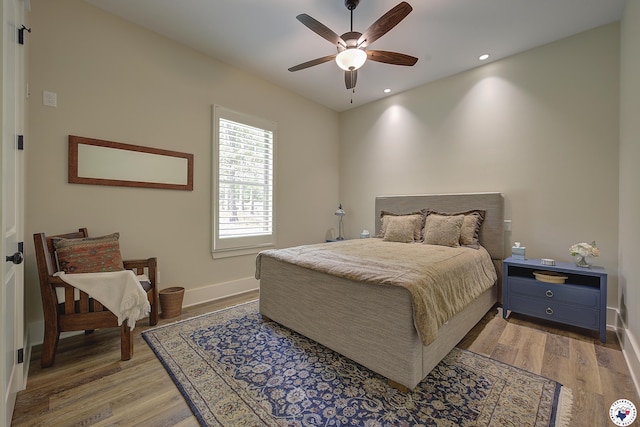 8907 River Ridge Drive, Texarkana, TX 75503 - bedroom featuring light wood finished floors, baseboards, recessed lighting, and a ceiling fan