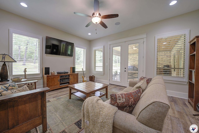 8907 River Ridge Drive, Texarkana, TX 75503 - living room with french doors, a ceiling fan, baseboards, wood finished floors, and recessed lighting