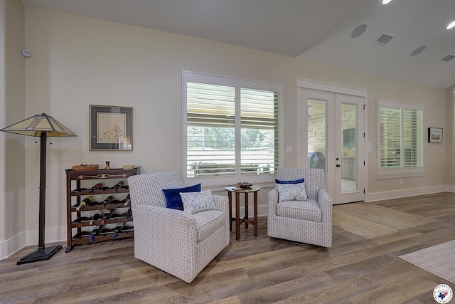 8907 River Ridge Drive, Texarkana, TX 75503 - sitting room featuring french doors, healthy amount of natural light, wood finished floors, and baseboards