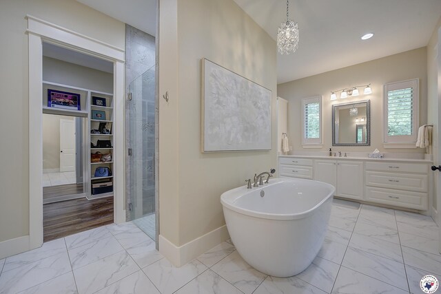 8907 River Ridge Drive, Texarkana, TX 75503 - full bathroom featuring marble finish floors, baseboards, tiled shower, a soaking tub, and recessed lighting
