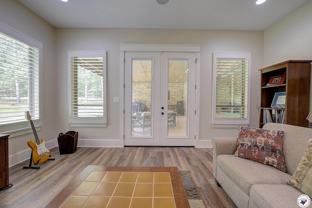 8907 River Ridge Drive, Texarkana, TX 75503 - entryway featuring french doors, wood finished floors, baseboards, and recessed lighting