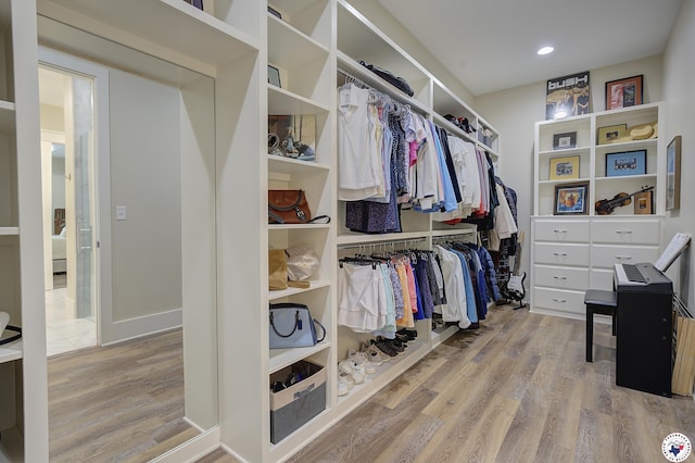 8907 River Ridge Drive, Texarkana, TX 75503 - spacious closet with wood finished floors