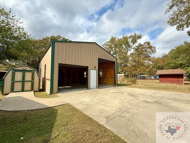 garage featuring a yard