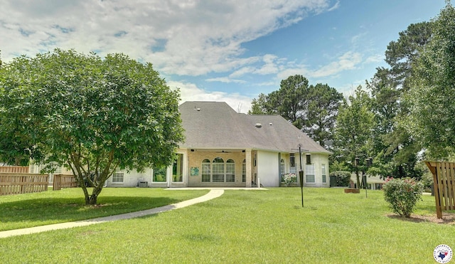 1067 Beaver Lake Dr, Texarkana, TX 75501 - rear view of property with a ceiling fan and a shingled roof