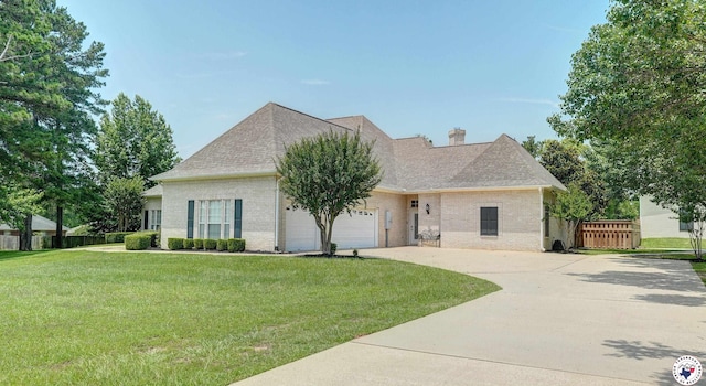 1067 Beaver Lake Dr, Texarkana, TX 75501 - view of front of property with concrete driveway, brick siding, a garage, roof with shingles, and a chimney