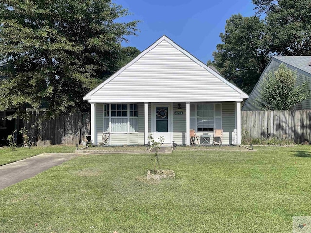 bungalow-style home with a porch and a front yard