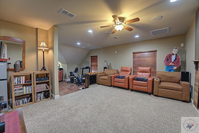 cinema featuring ceiling fan, carpet floors, and lofted ceiling