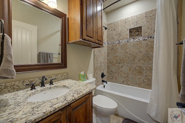 full bathroom with vanity, toilet, and shower / tub combo