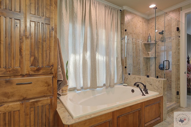 bathroom featuring crown molding and independent shower and bath