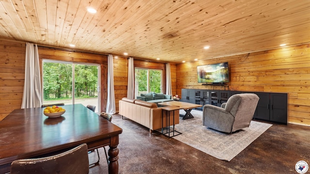 77 Big Rock Cir, Texarkana, AR 71854 - living room featuring wooden ceiling, wood walls, finished concrete flooring, and recessed lighting