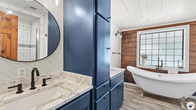 77 Big Rock Cir, Texarkana, AR 71854 - bathroom featuring vanity, wood finished floors, a soaking tub, wood walls, and wood ceiling