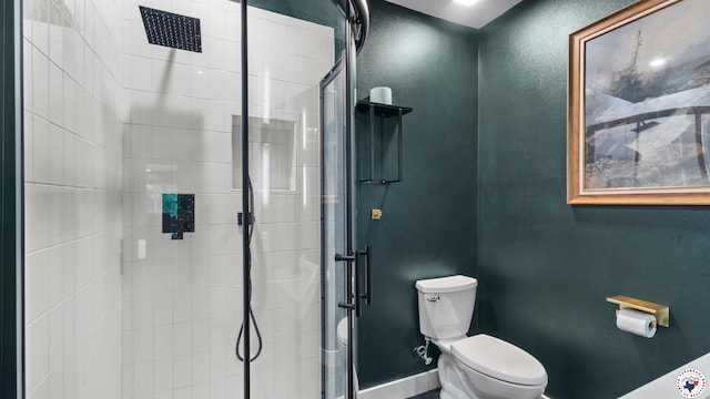 77 Big Rock Cir, Texarkana, AR 71854 - full bathroom featuring toilet, a stall shower, and baseboards