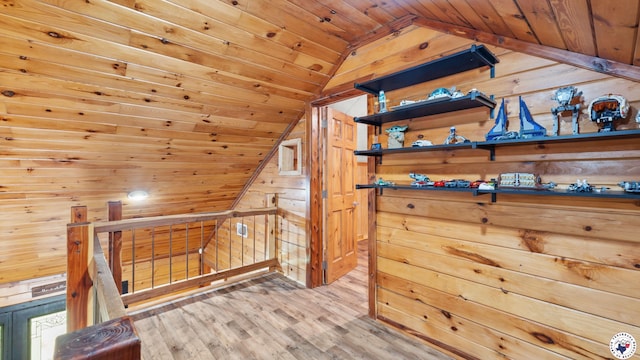 77 Big Rock Cir, Texarkana, AR 71854 - unfurnished bedroom with lofted ceiling, wood walls, wooden ceiling, and wood finished floors