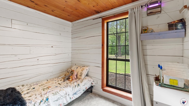 77 Big Rock Cir, Texarkana, AR 71854 - carpeted bedroom featuring wood ceiling and wooden walls